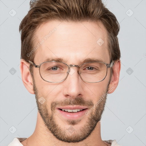 Joyful white adult male with short  brown hair and grey eyes