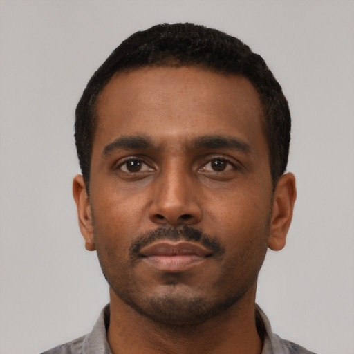 Neutral black young-adult male with short  black hair and brown eyes