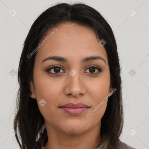 Joyful latino young-adult female with long  brown hair and brown eyes