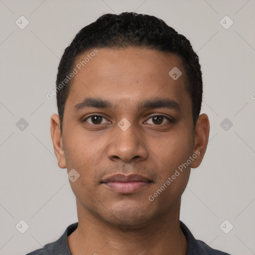 Neutral latino young-adult male with short  black hair and brown eyes