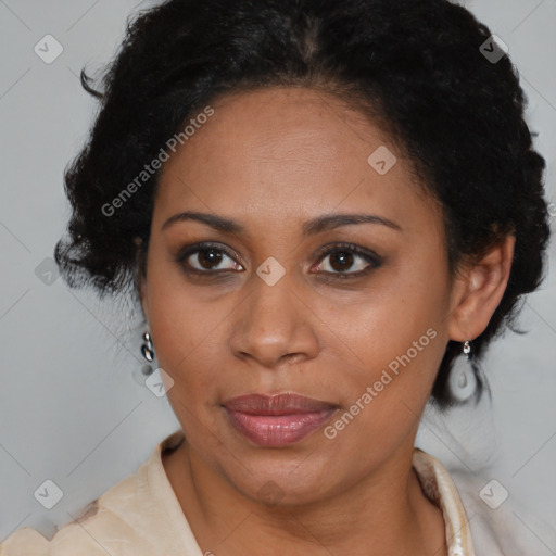 Joyful black adult female with medium  brown hair and brown eyes