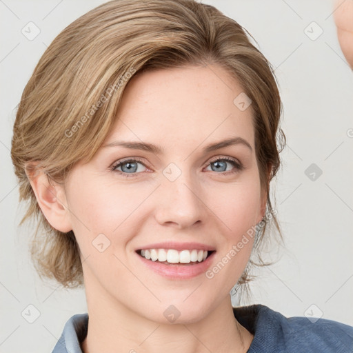 Joyful white young-adult female with medium  brown hair and blue eyes