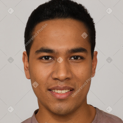 Joyful latino young-adult male with short  black hair and brown eyes