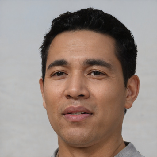 Neutral asian young-adult male with short  black hair and brown eyes