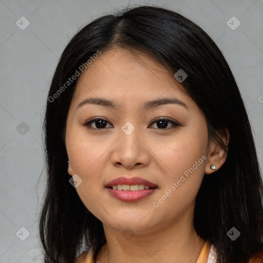 Joyful asian young-adult female with long  brown hair and brown eyes