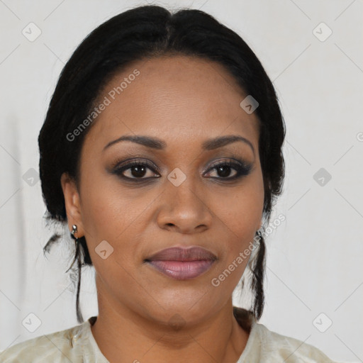 Joyful black young-adult female with medium  black hair and brown eyes