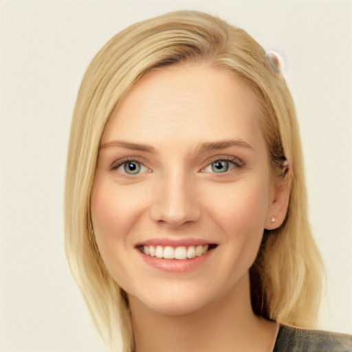 Joyful white young-adult female with long  brown hair and blue eyes