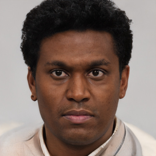 Neutral black young-adult male with short  brown hair and brown eyes