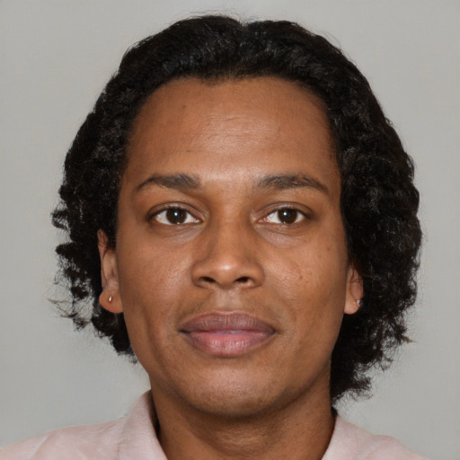 Neutral black adult female with short  black hair and brown eyes