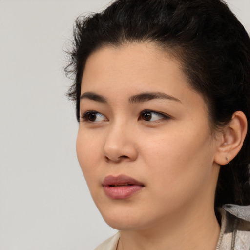 Neutral black young-adult female with short  black hair and brown eyes