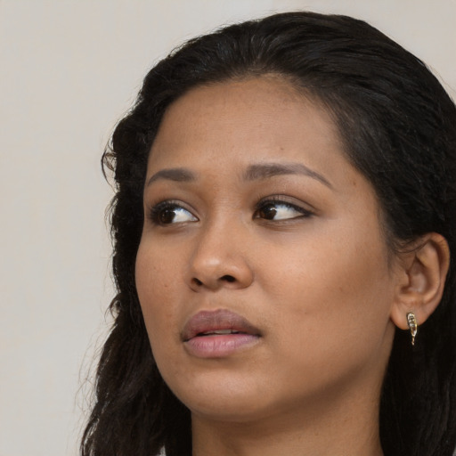 Neutral asian young-adult female with long  black hair and brown eyes