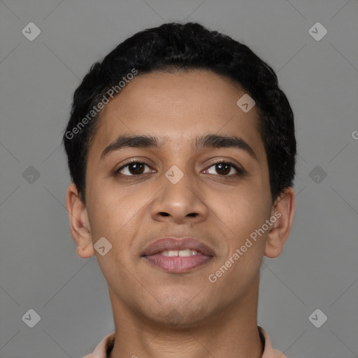 Joyful latino young-adult male with short  black hair and brown eyes