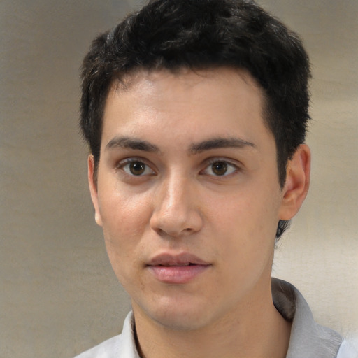 Neutral white young-adult male with short  black hair and brown eyes