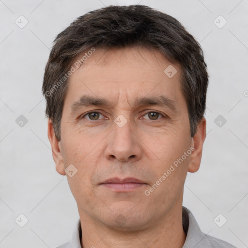 Neutral white adult male with short  brown hair and brown eyes