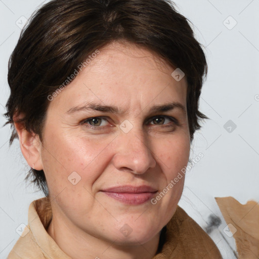 Joyful white adult female with medium  brown hair and grey eyes