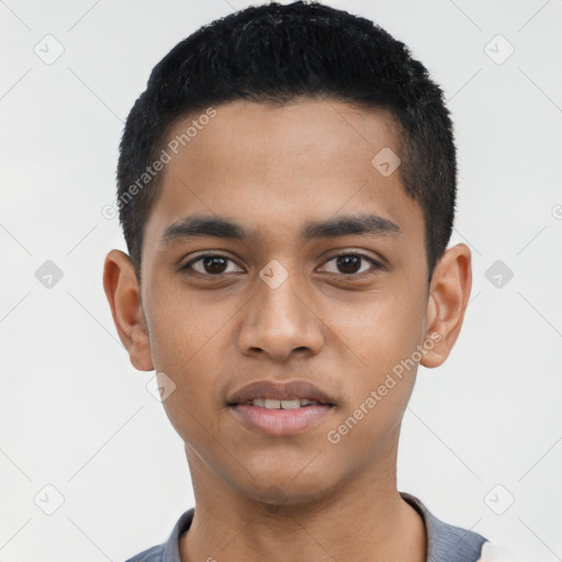 Joyful latino young-adult male with short  black hair and brown eyes