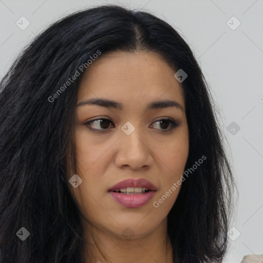 Joyful latino young-adult female with long  brown hair and brown eyes