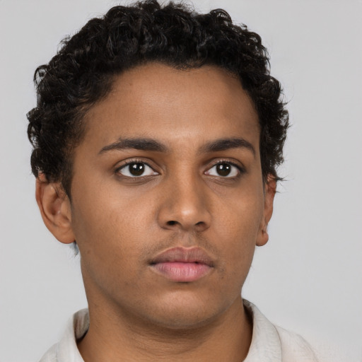 Neutral black young-adult female with short  brown hair and brown eyes