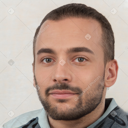 Neutral white young-adult male with short  brown hair and brown eyes