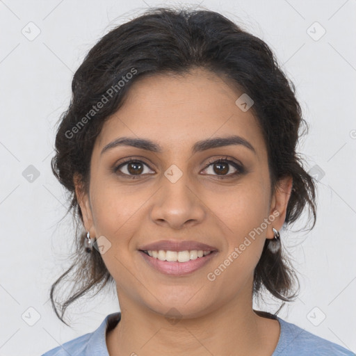 Joyful latino young-adult female with medium  brown hair and brown eyes