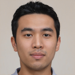 Neutral asian young-adult male with short  black hair and brown eyes