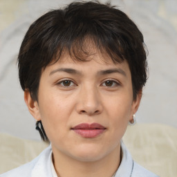 Joyful white adult female with medium  brown hair and brown eyes