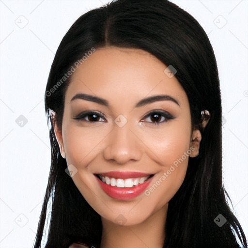 Joyful latino young-adult female with long  black hair and brown eyes