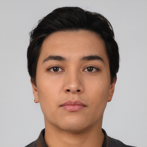 Neutral latino young-adult male with short  black hair and brown eyes
