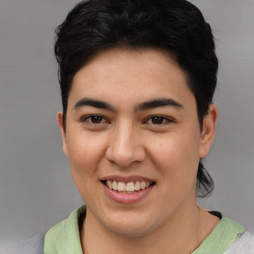 Joyful asian young-adult female with short  brown hair and brown eyes
