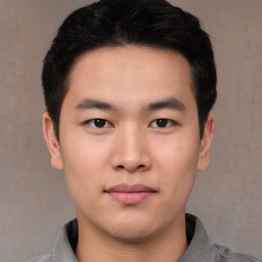 Neutral asian young-adult male with short  black hair and brown eyes