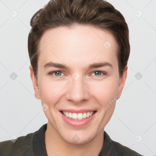 Joyful white young-adult female with short  brown hair and grey eyes