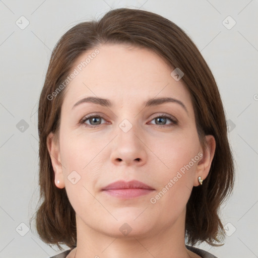 Neutral white young-adult female with medium  brown hair and grey eyes