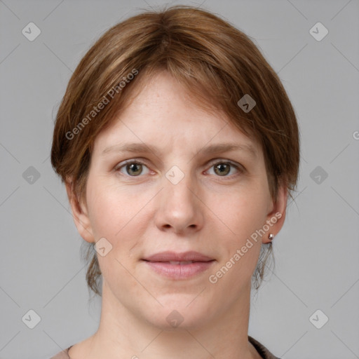 Joyful white young-adult female with medium  brown hair and grey eyes