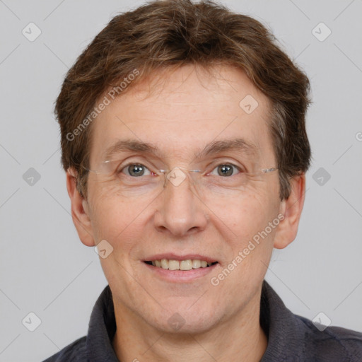 Joyful white adult male with short  brown hair and grey eyes