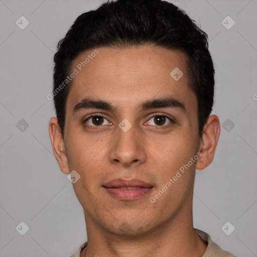 Joyful white young-adult male with short  black hair and brown eyes