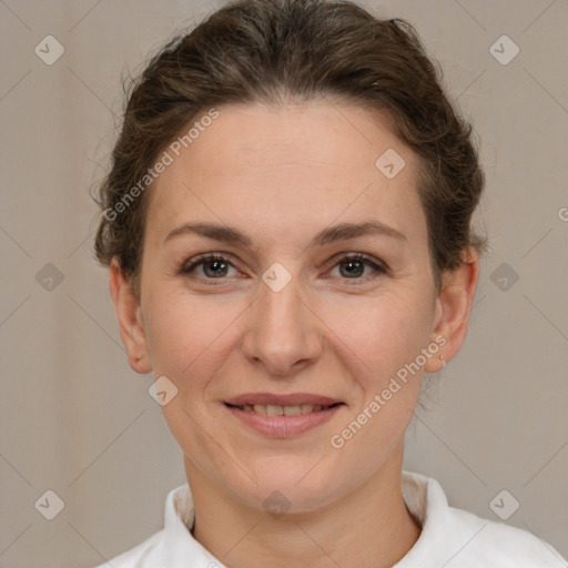 Joyful white adult female with short  brown hair and brown eyes