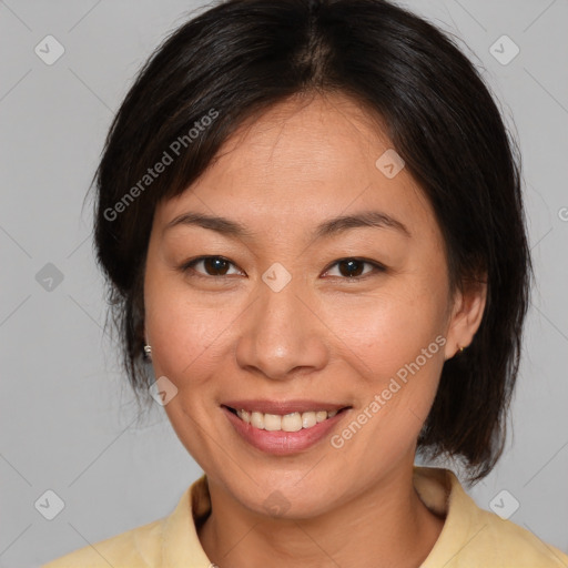 Joyful white adult female with medium  brown hair and brown eyes