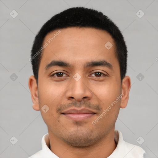 Joyful latino young-adult male with short  black hair and brown eyes