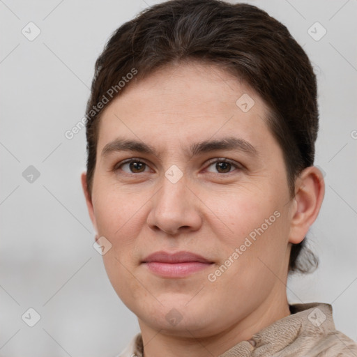 Joyful white young-adult female with short  brown hair and brown eyes