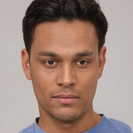 Neutral latino young-adult male with short  brown hair and brown eyes