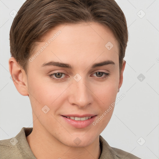 Joyful white young-adult female with short  brown hair and grey eyes