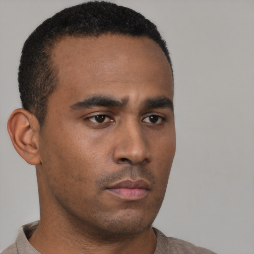 Neutral latino young-adult male with short  brown hair and brown eyes