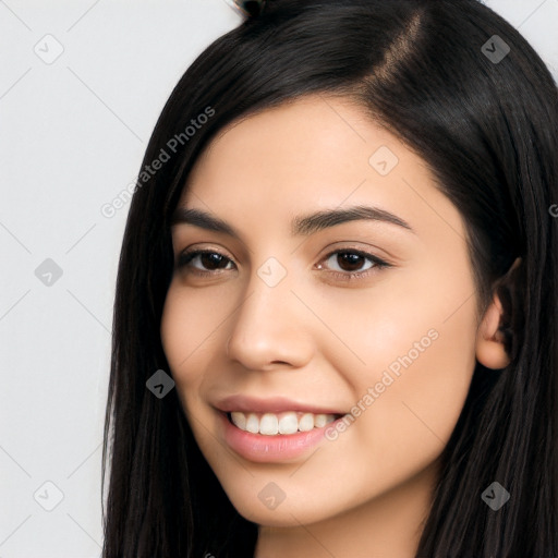 Joyful latino young-adult female with long  black hair and brown eyes