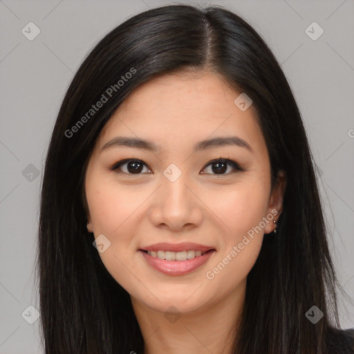 Joyful asian young-adult female with long  brown hair and brown eyes