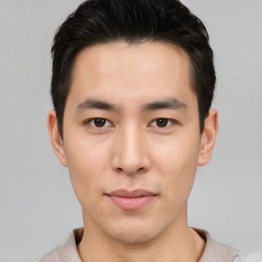 Neutral asian young-adult male with short  brown hair and brown eyes
