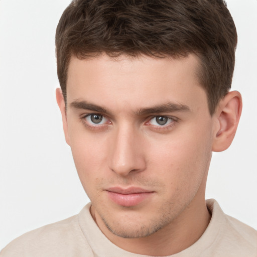 Neutral white young-adult male with short  brown hair and brown eyes