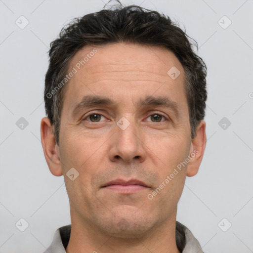 Neutral white adult male with short  brown hair and brown eyes