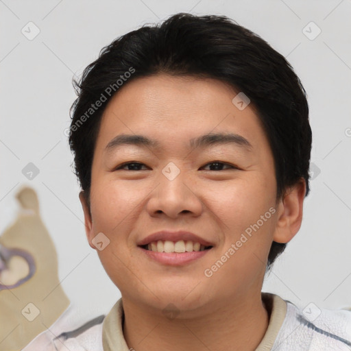 Joyful asian young-adult female with short  black hair and brown eyes