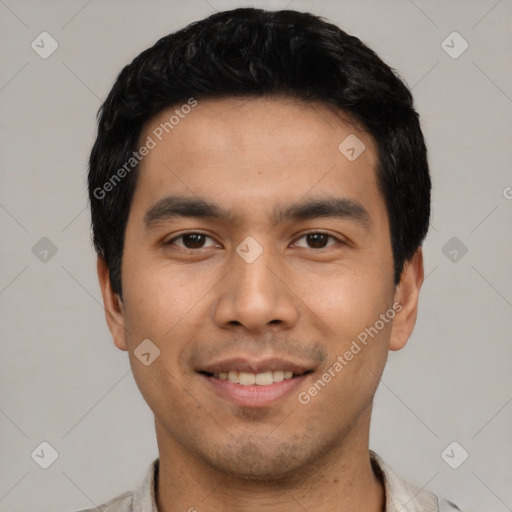 Joyful asian young-adult male with short  black hair and brown eyes