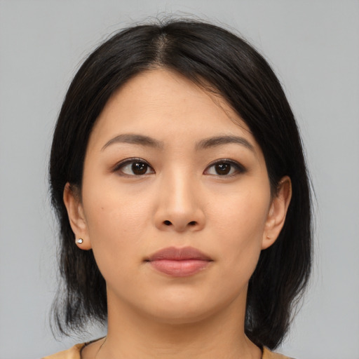 Neutral asian young-adult female with medium  black hair and brown eyes